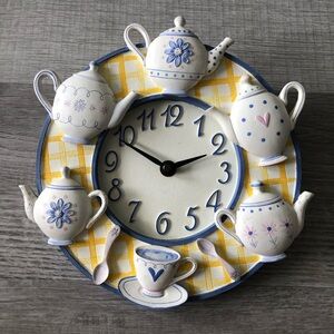 Ceramic Wall Clock. Teapots, cup and spoons designs